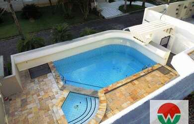 Imagem: A casa em condomínio possui 5 Dormitórios, 5 Banheiros, 4