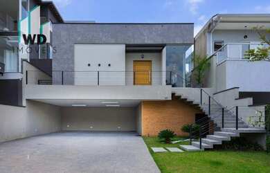 Imagem: A casa em condomínio possui 3 Dormitórios, 4 Banheiros, 5