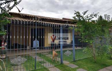 Imagem: A casa possui 3 Dormitórios, 2 Banheiros, 100m² de Área e