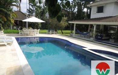 Imagem: A casa em condomínio possui 5 Dormitórios, 5 Banheiros, 5