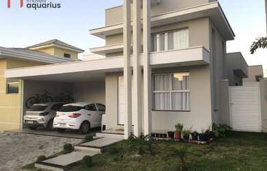 Imagem: A casa possui 3 Dormitórios, 3 Banheiros, 2 Vagas na garagem