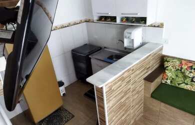 Imagem: A casa possui 2 Dormitórios, 1 Vaga na garagem e está localizado