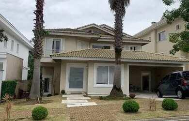 Imagem: A casa em condomínio possui 4 Dormitórios, 4 Banheiros, 4