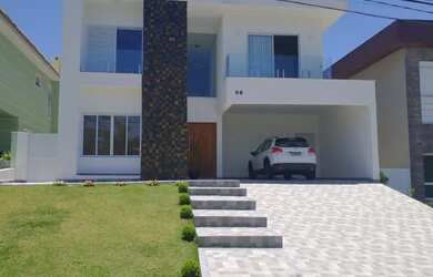 Imagem: A casa em condomínio possui 4 Dormitórios, 5 Banheiros, 4