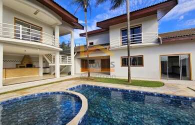 Imagem: A casa em condomínio possui 4 Dormitórios, 5 Banheiros, 4