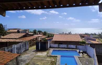 Imagem: A casa possui 2 Dormitórios e 2 Banheiros e está localizado