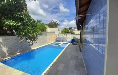 Imagem: A casa possui 3 Dormitórios, 5 Banheiros, 4 Vagas na garagem