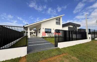 Imagem: A casa à venda possui 3 Dormitórios, 3 Banheiros, 2 Vagas