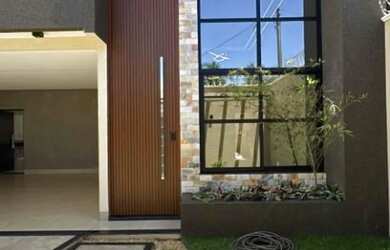 Imagem: A casa possui 3 Dormitórios, 3 Banheiros, 4 Vagas na garagem