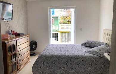 Imagem: A casa em condomínio possui 3 Dormitórios, 2 Banheiros, 1