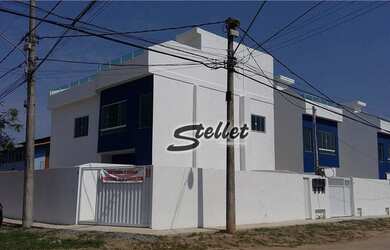 Imagem: A casa possui 2 Dormitórios, 3 Banheiros, 2 Vagas na garagem