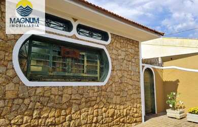 Imagem: A casa possui 5 Dormitórios, 4 Banheiros, 4 Vagas na garagem