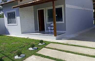 Imagem: A casa possui 2 Dormitórios, 3 Banheiros, 2 Vagas na garagem