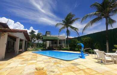 Imagem: A casa possui 5 Dormitórios, 5 Banheiros, 5 Vagas na garagem