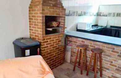 Imagem: A casa possui 2 Dormitórios, 2 Banheiros, 1 Vaga na garagem