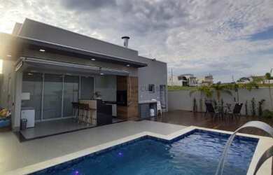 Imagem: A casa possui 3 Dormitórios, 4 Banheiros, 4 Vagas na garagem