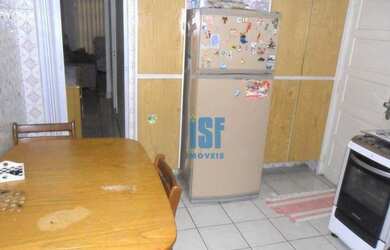 Imagem: A casa possui 2 Dormitórios, 1 Banheiro, 2 Vagas na garagem