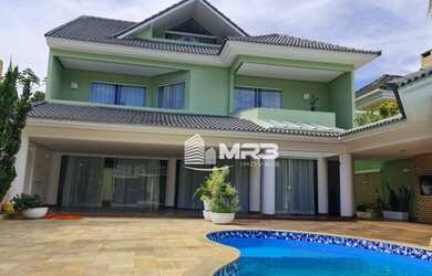 Imagem: A casa em condomínio possui 5 Dormitórios, 5 Banheiros, 4