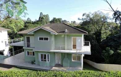 Imagem: A casa em condomínio possui 4 Dormitórios, 5 Banheiros, 4