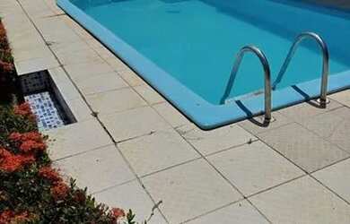 Imagem: A casa possui 2 Dormitórios, 4 Vagas na garagem e está localizado