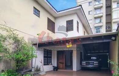 Imagem: A casa possui 3 Dormitórios, 4 Banheiros, 4 Vagas na garagem