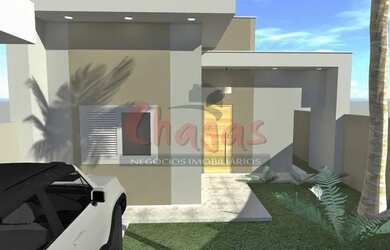 Imagem: A casa possui 3 Dormitórios, 2 Banheiros, 2 Vagas na garagem