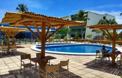 Imagem: A casa possui 2 Dormitórios, 3 Banheiros, 2 Vagas na garagem