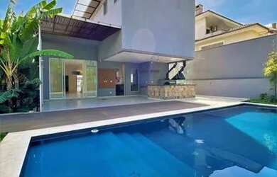 Imagem: A casa em condomínio possui 4 Dormitórios, 5 Banheiros, 4