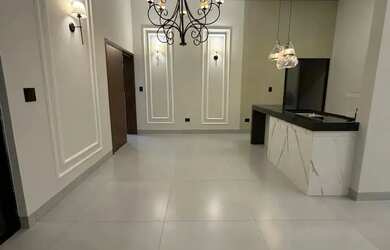 Imagem: A casa possui 3 Dormitórios, 2 Banheiros, 4 Vagas na garagem