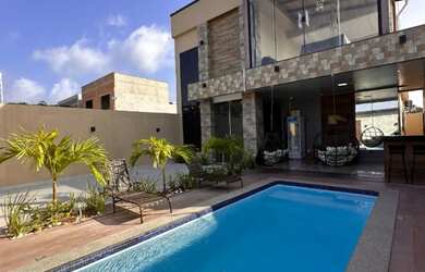 Imagem: A casa possui 5 Dormitórios, 5 Banheiros, 2 Vagas na garagem