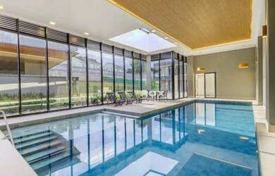 Imagem: A casa em condomínio possui 4 Dormitórios, 5 Banheiros, 287m²