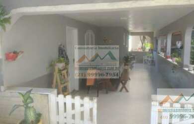 Imagem: A casa possui 5 Dormitórios, 5 Banheiros, 4 Vagas na garagem