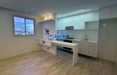 Imagem: O apartamento possui 2 Dormitórios, 1 Banheiro, 1 Vaga na garagem