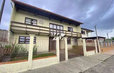 Imagem: A casa à venda possui 3 Dormitórios, 3 Banheiros, 5 Vagas