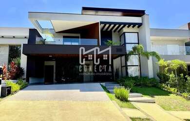 Imagem: A casa em condomínio possui 4 Dormitórios, 5 Banheiros, 4