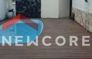 Imagem: A casa possui 3 Dormitórios, 2 Banheiros, 5 Vagas na garagem