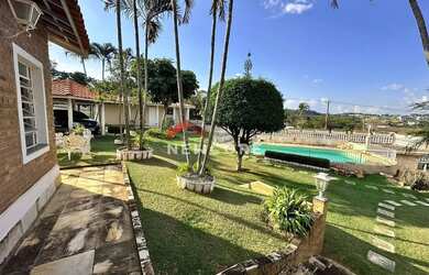 Imagem: A casa possui 5 Dormitórios, 5 Banheiros, 5 Vagas na garagem