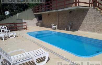 Imagem: A casa em condomínio possui 3 Dormitórios, 2 Banheiros, 1