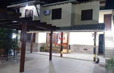 Imagem: A casa em condomínio possui 4 Dormitórios, 5 Banheiros, 2