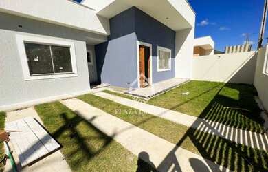 Imagem: A casa possui 3 Dormitórios, 2 Banheiros, 2 Vagas na garagem