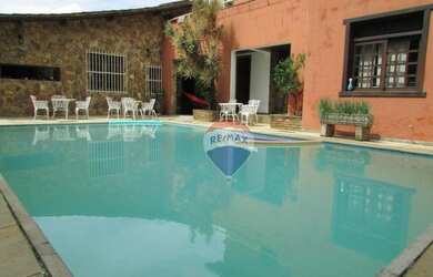 Imagem: A casa possui 5 Dormitórios, 5 Banheiros, 5 Vagas na garagem