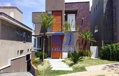 Imagem: A casa em condomínio possui 4 Dormitórios, 4 Banheiros, 5