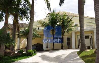 Imagem: A casa em condomínio possui 5 Dormitórios, 5 Banheiros, 2