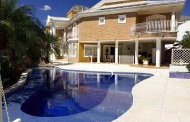 Imagem: A casa em condomínio possui 5 Dormitórios, 5 Banheiros, 4