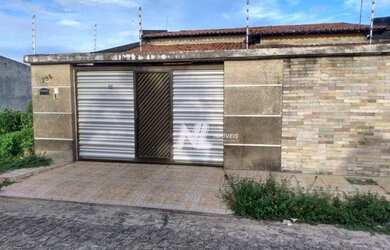 Imagem: A casa possui 3 Dormitórios, 2 Banheiros, 3 Vagas na garagem