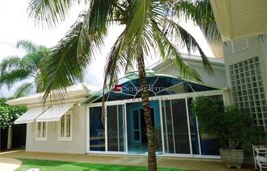 Imagem: A casa em condomínio possui 5 Dormitórios, 5 Banheiros, 3