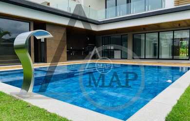 Imagem: A casa em condomínio possui 5 Dormitórios, 5 Banheiros, 4