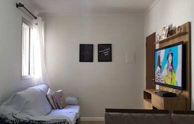 Imagem: O apartamento possui 2 Dormitórios, 1 Banheiro, 1 Vaga na garagem