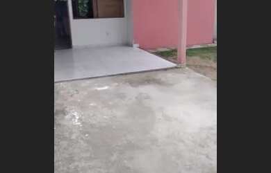 Imagem: A casa possui 2 Dormitórios, 2 Banheiros, 3 Vagas na garagem