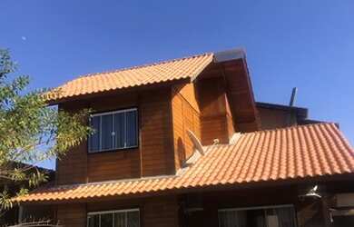 Imagem: A casa possui 3 Dormitórios, 2 Vagas na garagem, Churrasqueira